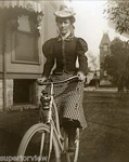 Antique Bicycle Woman Plaid Skirt Vintage Bike Lantern Hat With Feather 1897. Fixed Price $8.99.