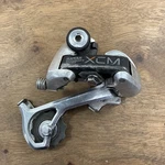 Suntour Xcm Accushift 3040 Long Cage Rear Derailleur 6/7 Speed Mountain Bike. Fixed Price $29.99.
