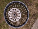 Black Excel Rear Rim With Brake And 48 Tooth Sprocket 19X2.15. Fixed Price $130.00.