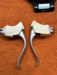 Weinmann Brake Levers W/ Qr & Rare White Carlton/raleigh Non-aero Hoods 1970S. Fixed Price $10.00.