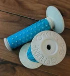 Oakley B-1B Bmx Grips White W/ Light Blue Sleeves. Fixed Price $165.00.