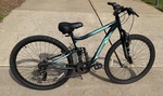 Mongoose Excursion 24-INCH Blueish Green Mountain Bike Wheel.check Were Pick Up. Fixed Price $55.00.
