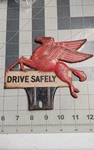 Mobil Pegasus Tin Drive Safely License Plate Topper. Fixed Price $110.00.