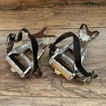Vintage Sugino PD-1000 Touring Pedals & Toeclips Right Broken. Fixed Price $39.99.