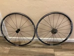 Shimano WH-RS11 Alloy Clincher Rim Brake Road Wheelset Bladed Spokes 700C. Fixed Price $220.00.